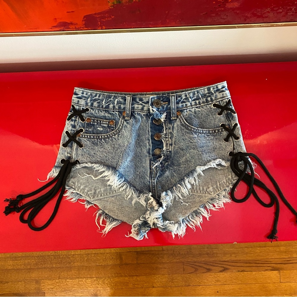 NWOT- distressed, jean shorts with laced tie strings.